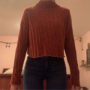 Orange turtleneck sweater